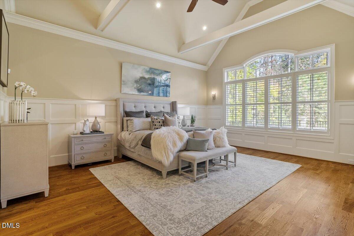 1413 Lily Estates Drive Raleigh, NC 27614 - Photo 15 of 82 a bed room with a bed and a couch