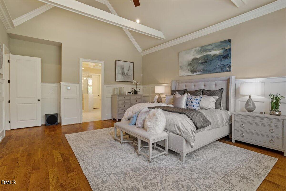 1413 Lily Estates Drive Raleigh, NC 27614 - Photo 17 of 82 a bed room with a bed and a lamp