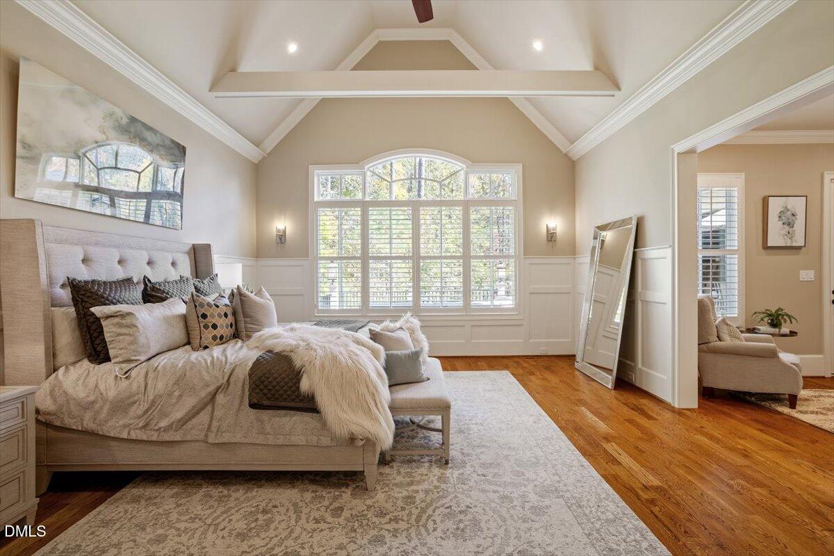 1413 Lily Estates Drive Raleigh, NC 27614 - Photo 18 of 82 a spacious bedroom with a large bed and a large window