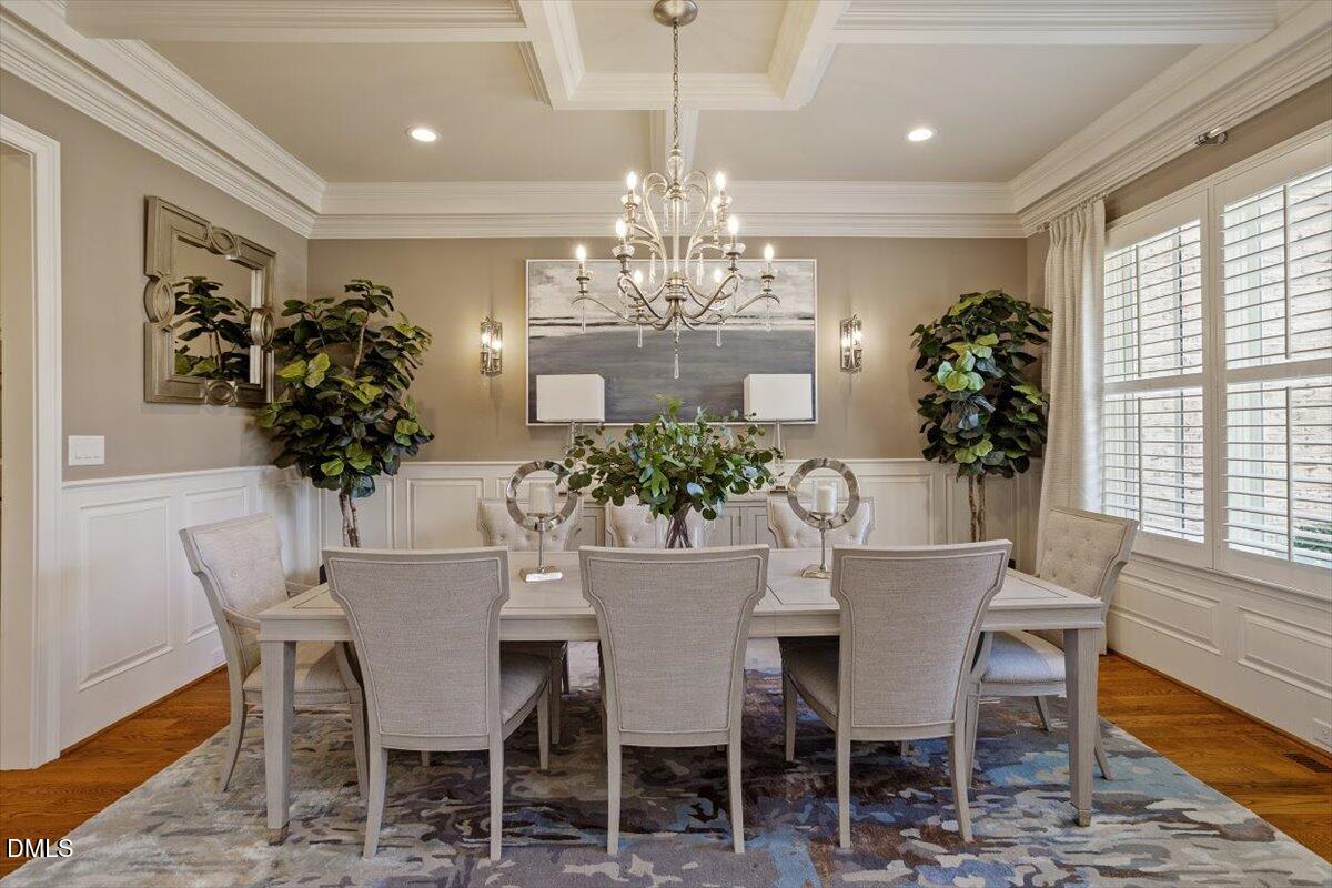 1413 Lily Estates Drive Raleigh, NC 27614 - Photo 24 of 82 a view of a dining room with furniture window and wooden floor