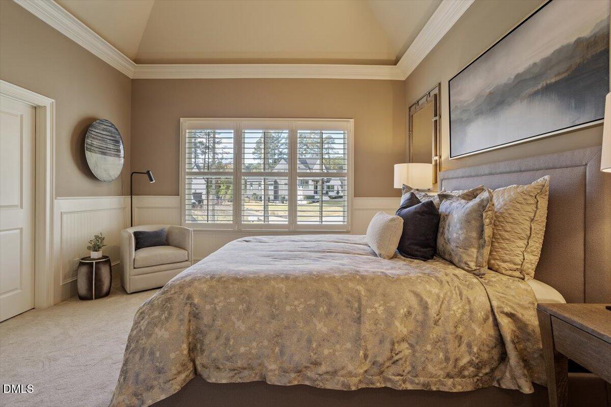1413 Lily Estates Drive Raleigh, NC 27614 - Photo 47 of 82 a bedroom with a bed and a large window