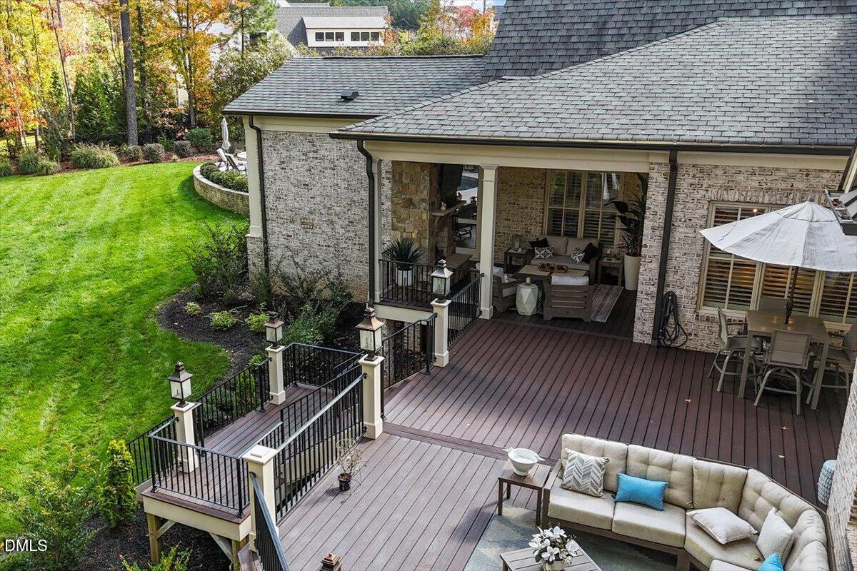 1413 Lily Estates Drive Raleigh, NC 27614 - Photo 62 of 82 a view of a house with backyard and sitting area