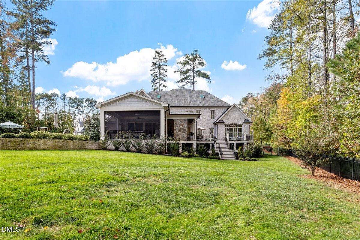 1413 Lily Estates Drive Raleigh, NC 27614 - Photo 66 of 82 a view of a house with a yard and sitting area