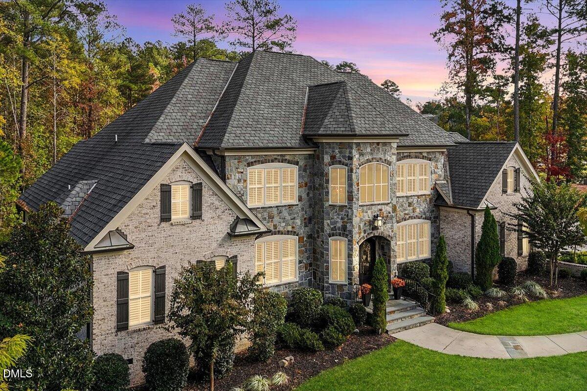 1413 Lily Estates Drive Raleigh, NC 27614 - Photo 4 of 82 a front view of a house with garden