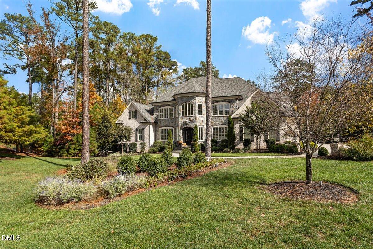 1413 Lily Estates Drive Raleigh, NC 27614 - Photo 5 of 82 a front view of a house with a yard