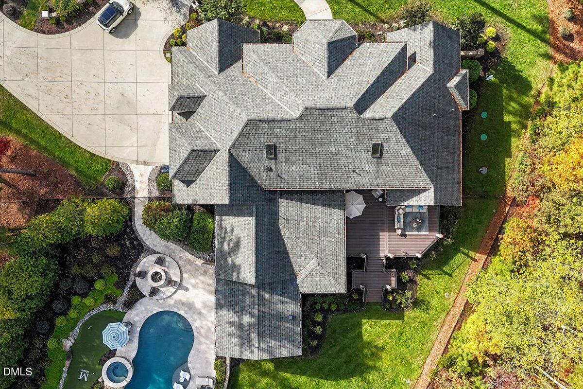 1413 Lily Estates Drive Raleigh, NC 27614 - Photo 79 of 82 an aerial view of a house with swimming pool and garden