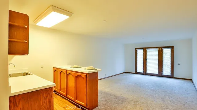 a view of a room with washer and dryer