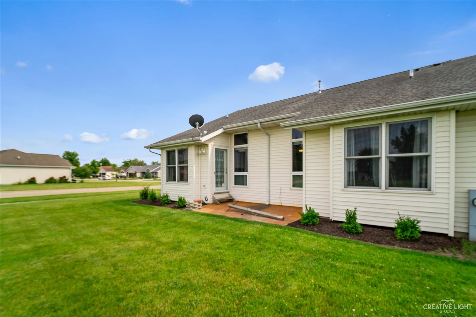 401 Lake Lida Lane Rochelle, IL 61068 - Photo 19 of 20 a front view of house with yard and green space