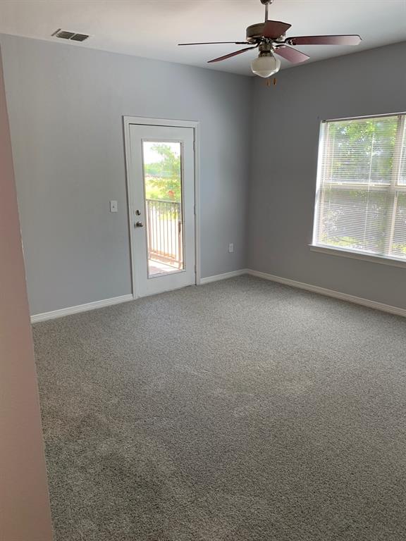 101 South Alabama Street, Unit 11 Celina, TX 75009 - Photo 7 of 8 an empty room with a window