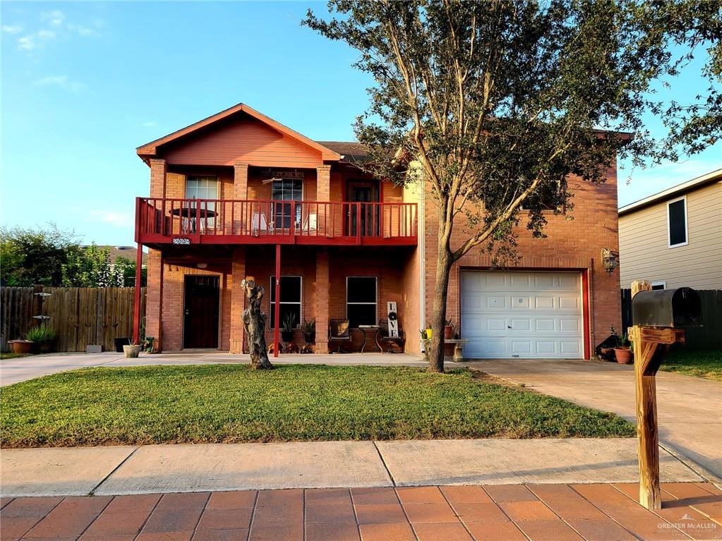 2008 West 40th Street Mission, TX 78573 - Photo 1 of 1 a front view of a house with a yard and trees