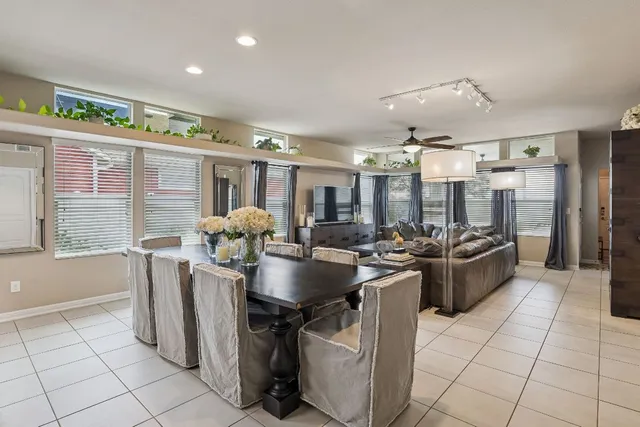 a kitchen with stainless steel appliances granite countertop a sink a counter space and cabinets