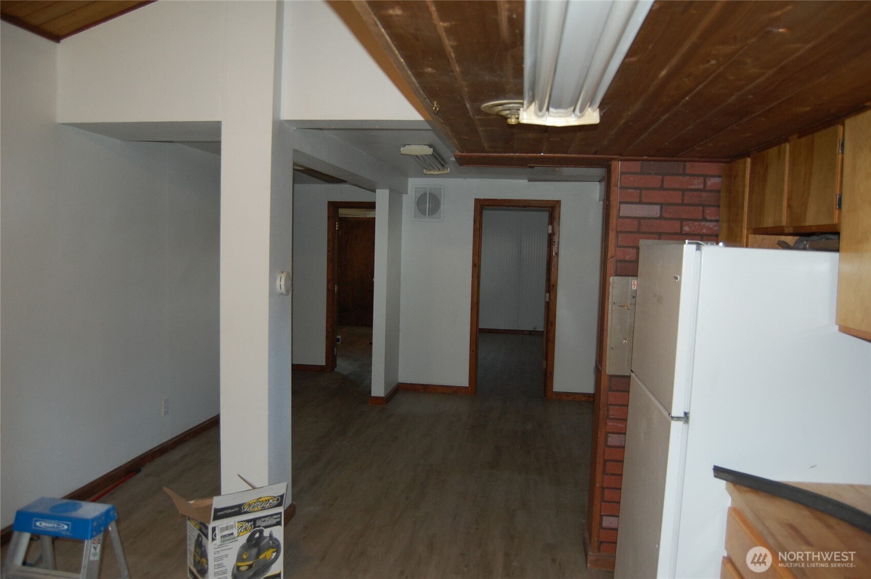 117 Lake Street Conconully, WA 98819 - Photo 5 of 10 a view of hallway with wooden floor