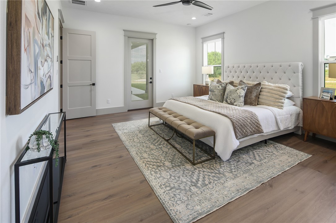 7933 Stiteler Drive Bryan, TX 77808 - Photo 29 of 44 a spacious bedroom with a bed and window