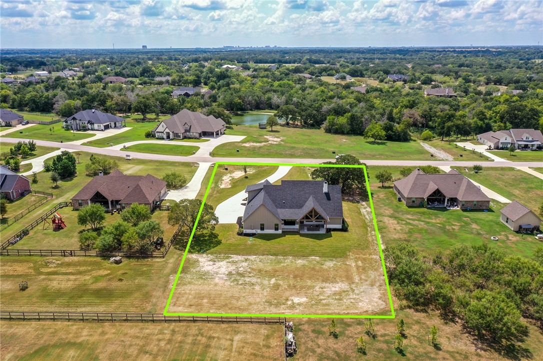 7933 Stiteler Drive Bryan, TX 77808 - Photo 3 of 44 an aerial view of a houses with outdoor space