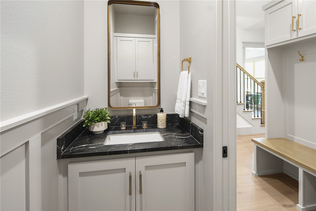 7933 Stiteler Drive Bryan, TX 77808 - Photo 34 of 44 Bathroom with light wood finished floors and vanity