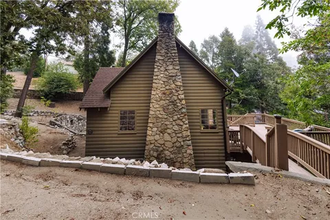 a view of a house and a yard