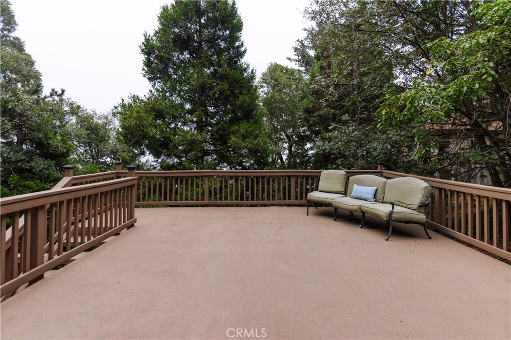22771 Crest Forest Drive Crestline, CA 92325 - Photo 9 of 26 a view of balcony with furniture