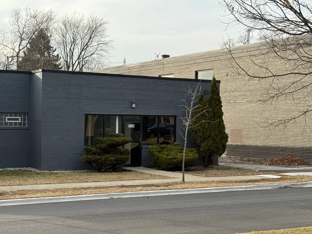 a view of a house with a street
