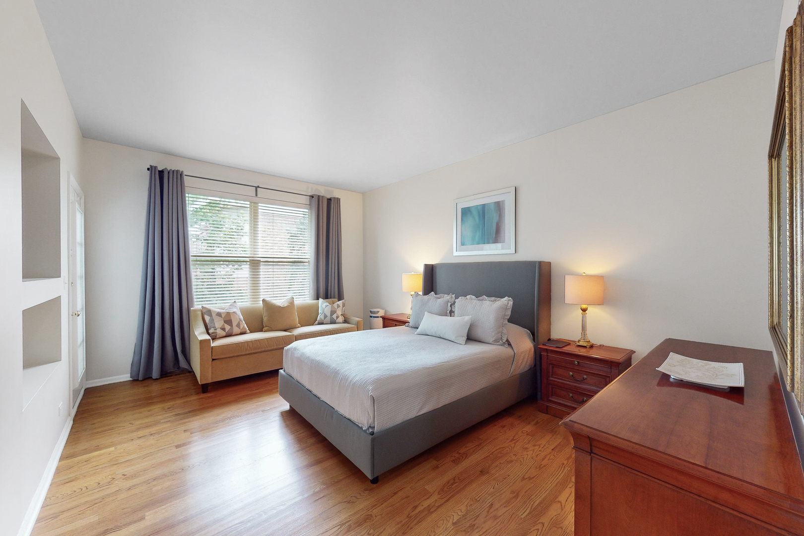 768 St Johns Place Addison, IL 60101 - Photo 14 of 34 a bedroom with a bed and a couch