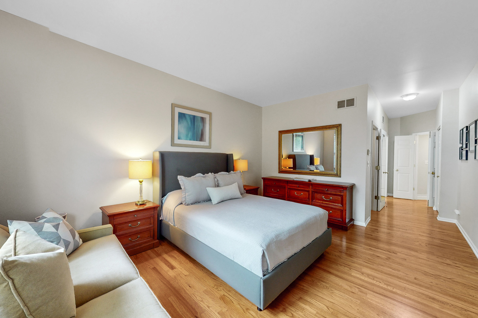 768 St Johns Place Addison, IL 60101 - Photo 15 of 34 a bedroom with a bed and a night stand