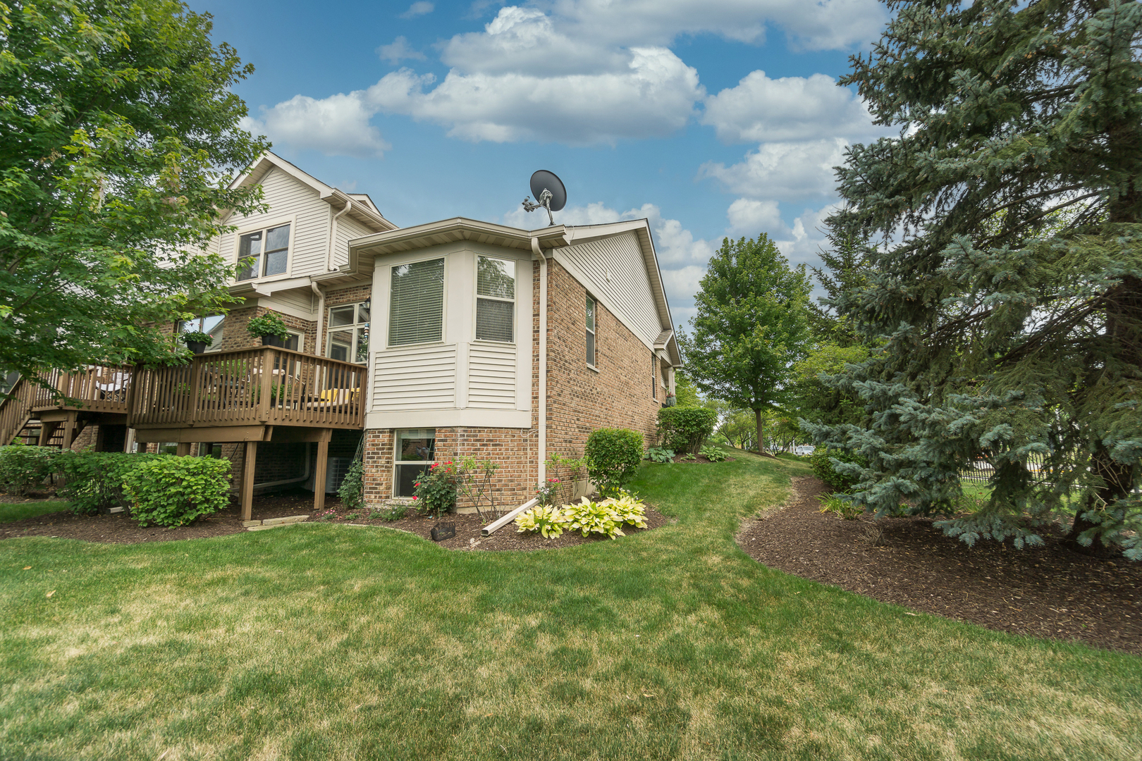 768 St Johns Place Addison, IL 60101 - Photo 28 of 34 a front view of a house with garden