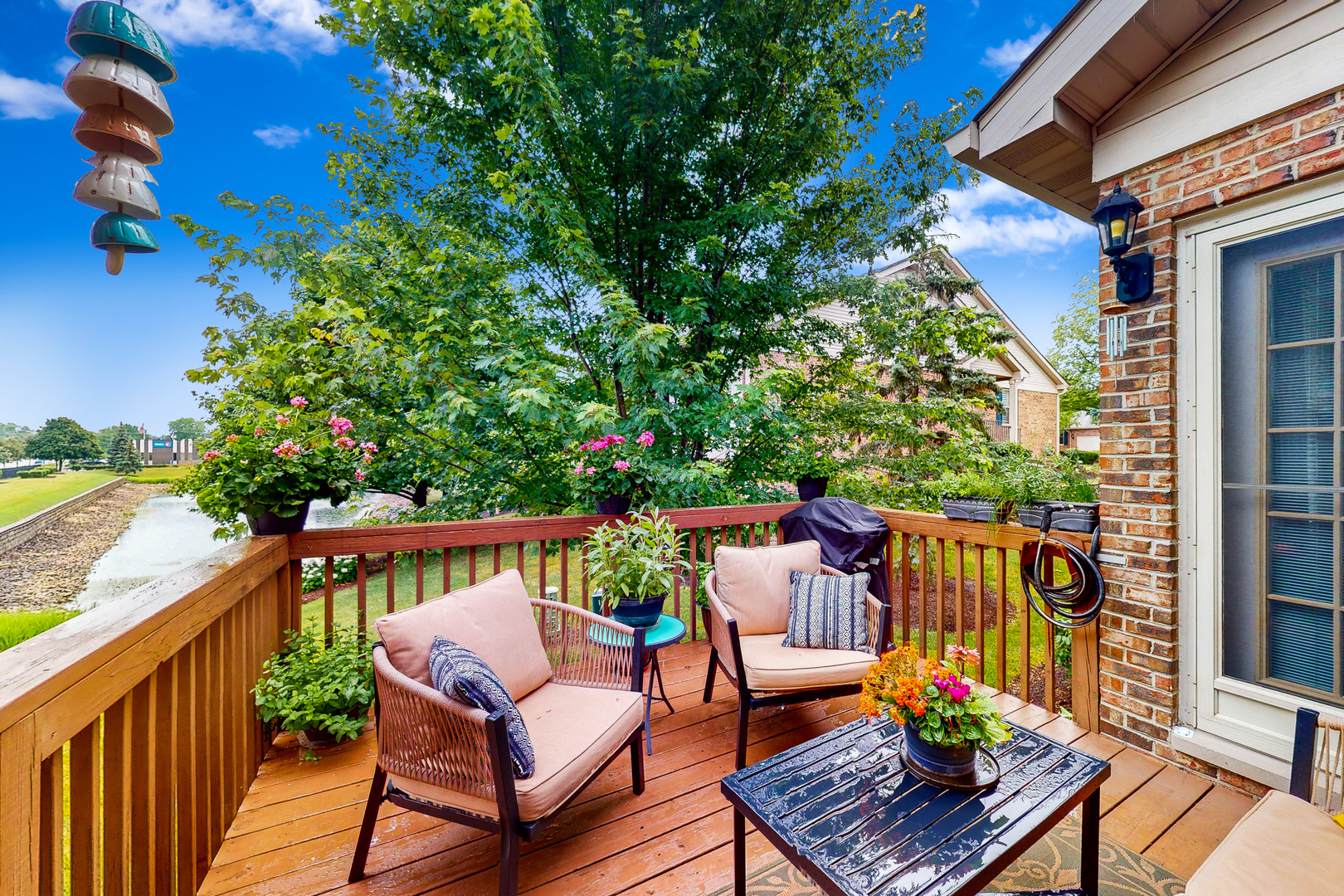 768 St Johns Place Addison, IL 60101 - Photo 29 of 34 a view of a chair and tables in the balcony