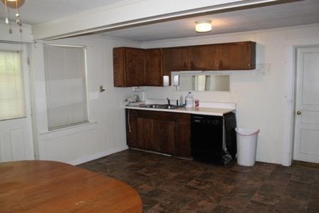 200 Circle Drive Springfield, TN 37172 - Photo 8 of 16 a kitchen with a sink and a mirror