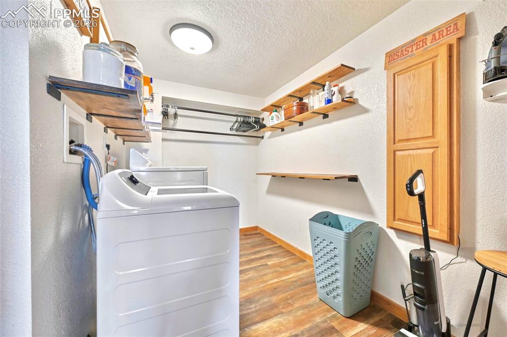 18560 Chelton Road Ramah, CO 80832 - Photo 27 of 34 a utility room with dryer and washer