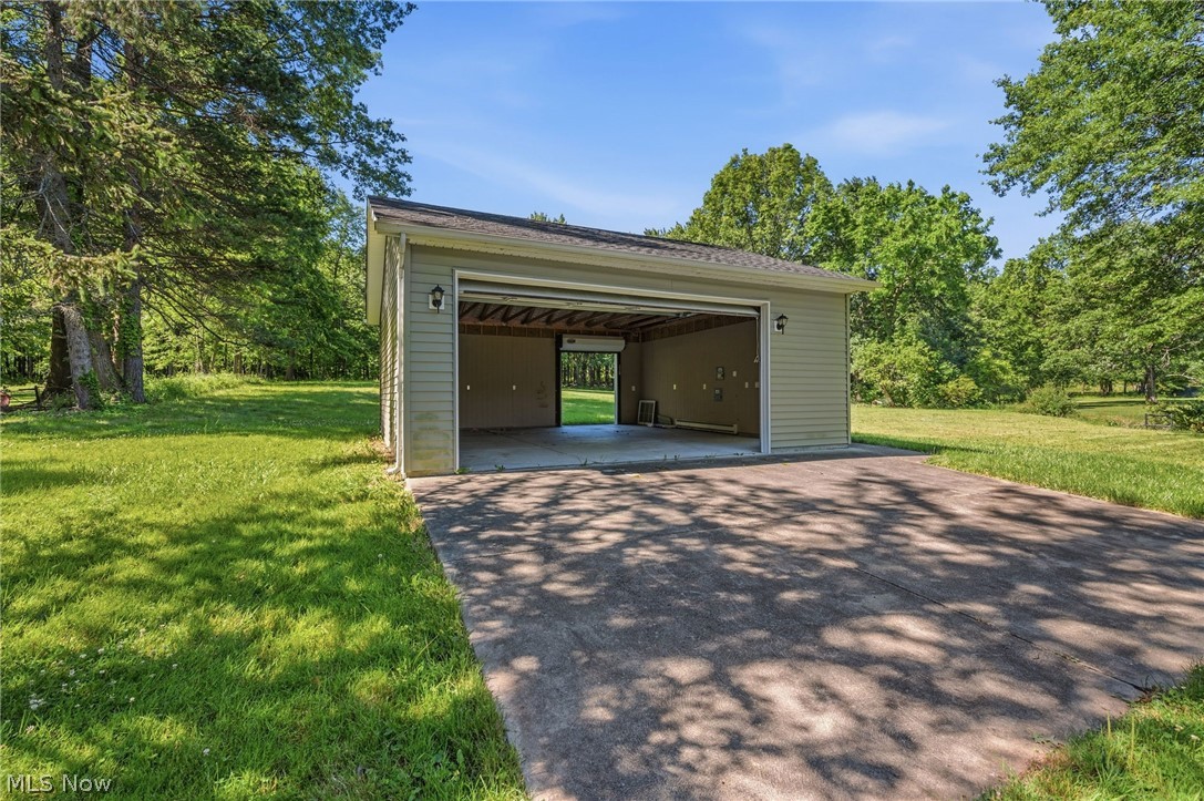 6832 Hillside Road Independence, OH 44131 - Photo 37 of 44 Secondary, drive through garage on property