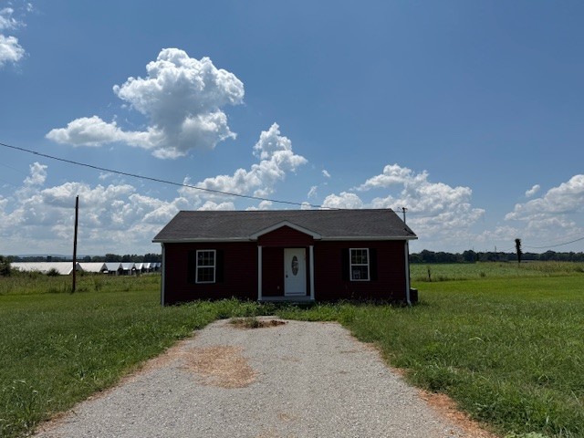 12 Hesselly Road Decherd, TN 37324 - Photo 13 of 13 a front view of a house with garden