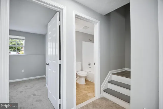 a view of bathroom with a toilet sink