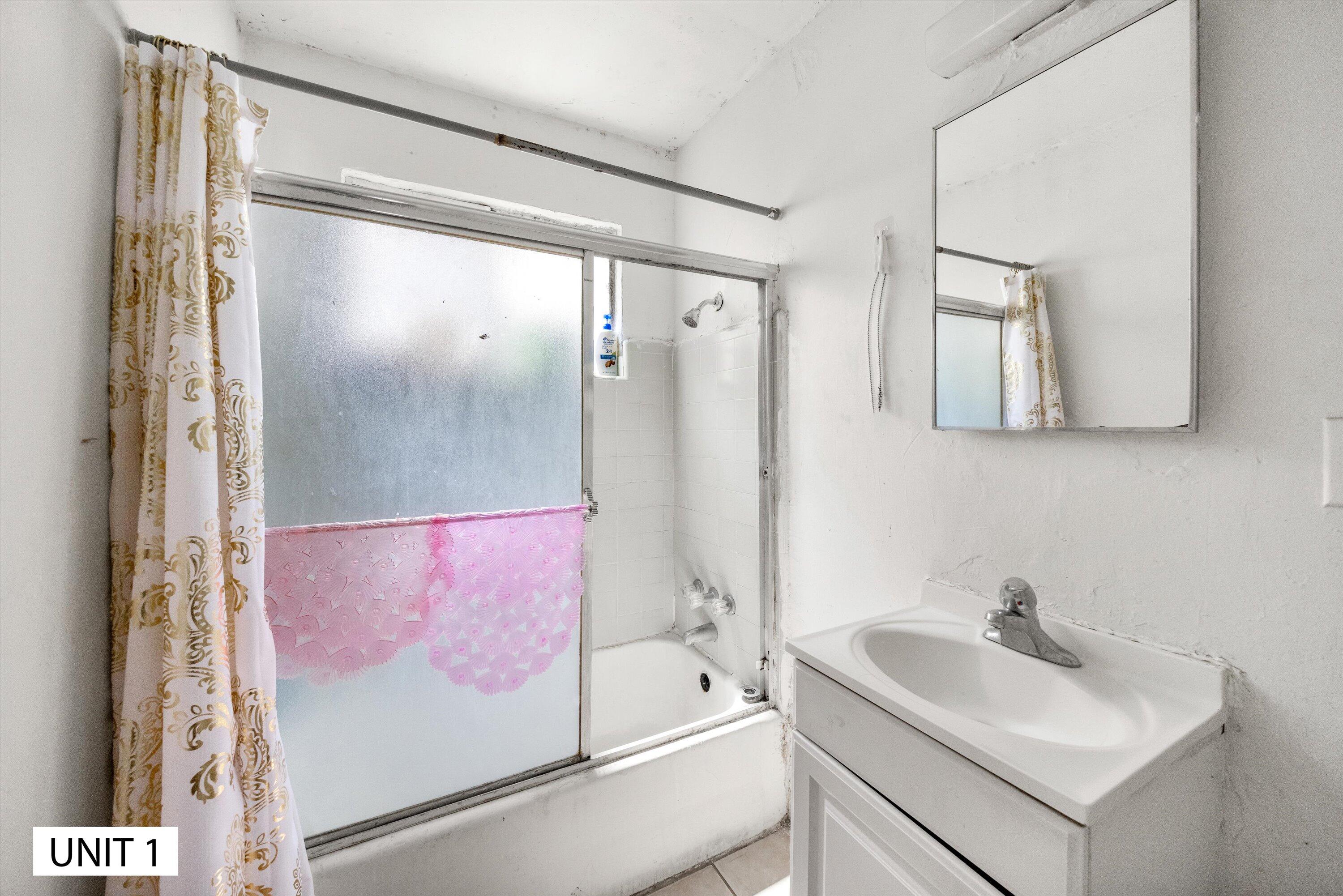 5859 Mandarin Drive Santa Barbara, CA 93117 - Photo 13 of 55 a bathroom with a sink and a mirror