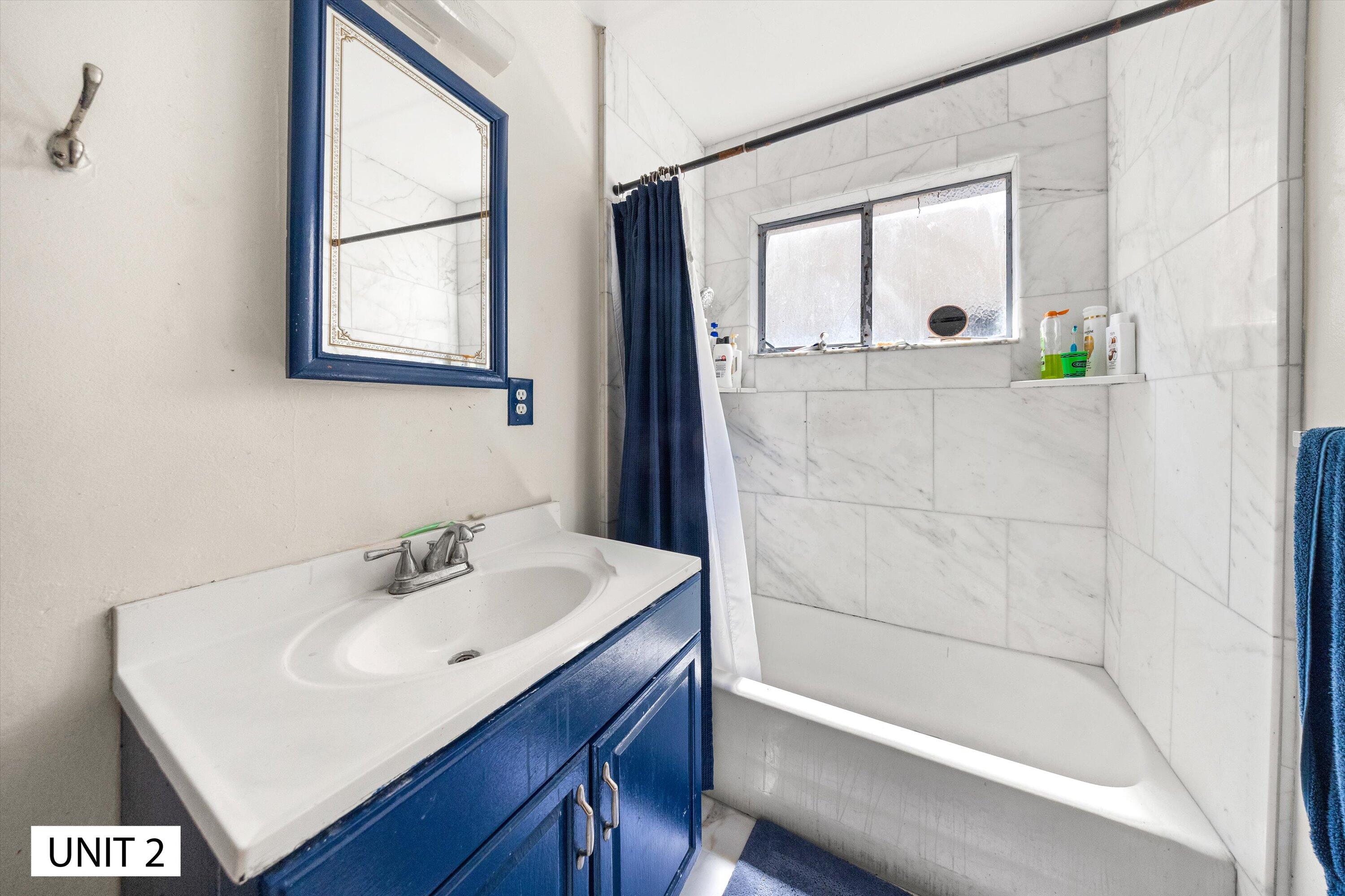 5859 Mandarin Drive Santa Barbara, CA 93117 - Photo 21 of 55 a bathroom with a sink and a mirror