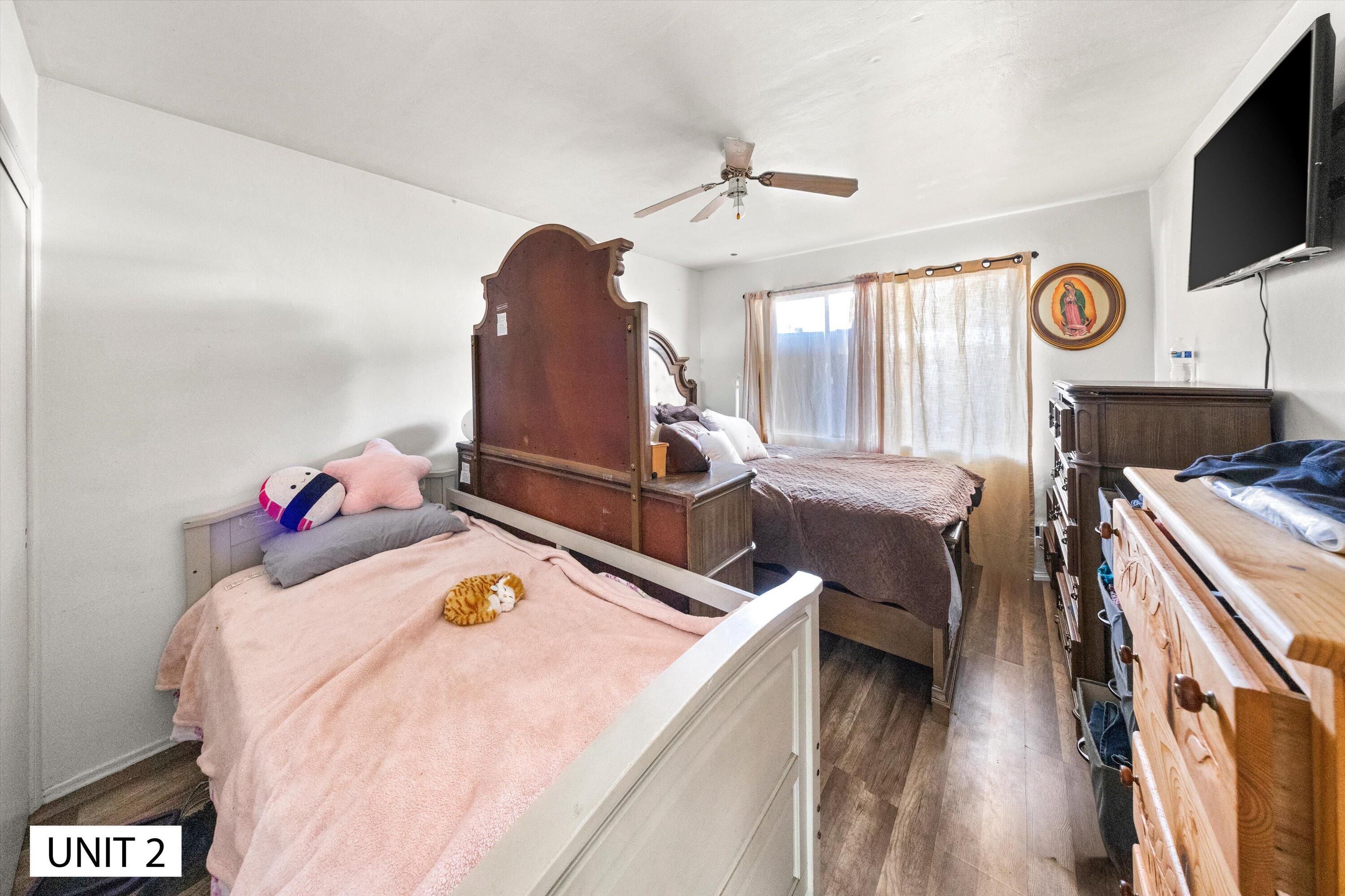 5859 Mandarin Drive Santa Barbara, CA 93117 - Photo 22 of 55 a bedroom with bed and a flat tv screen on dresser