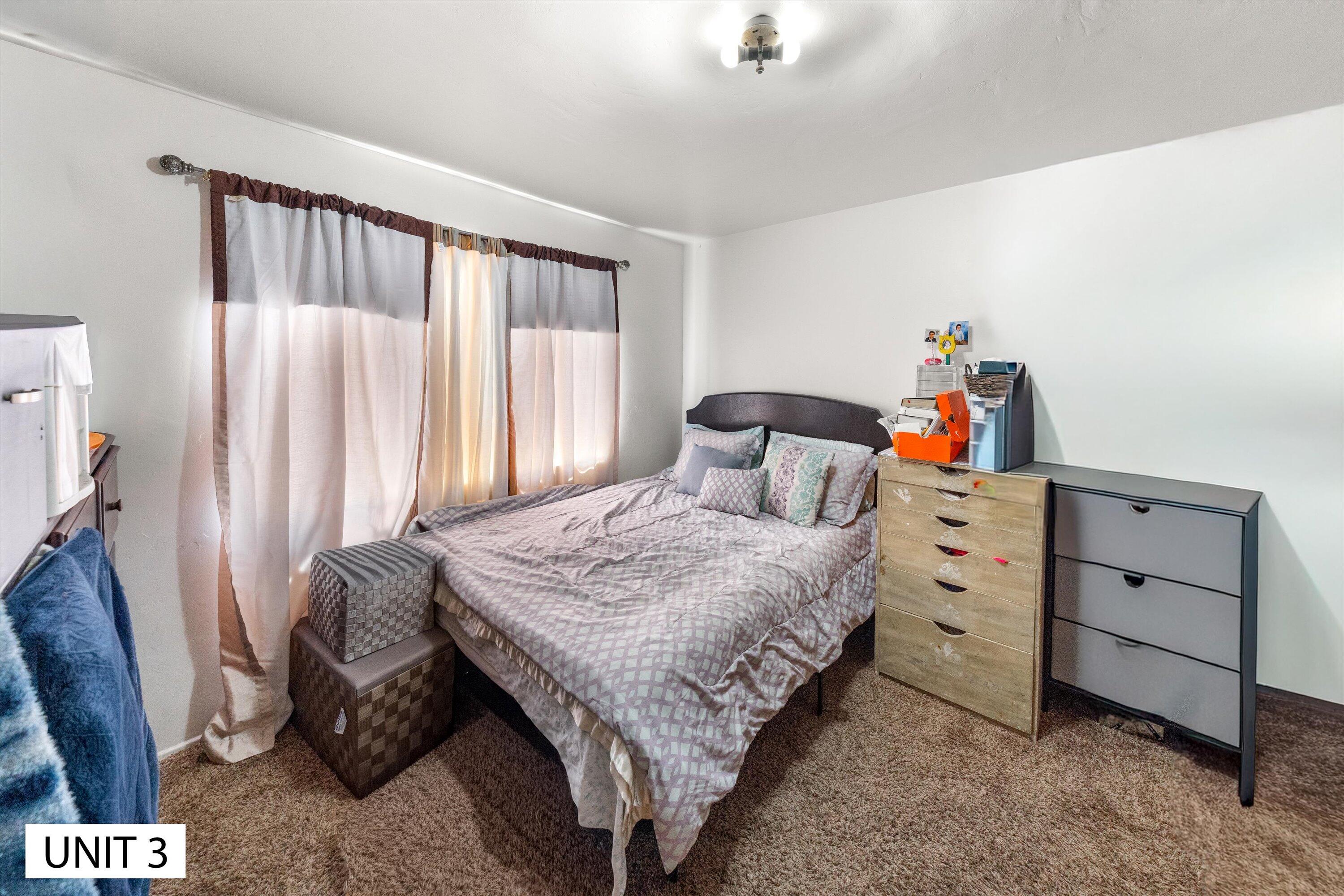 5859 Mandarin Drive Santa Barbara, CA 93117 - Photo 26 of 55 a bedroom with a bed and a dresser