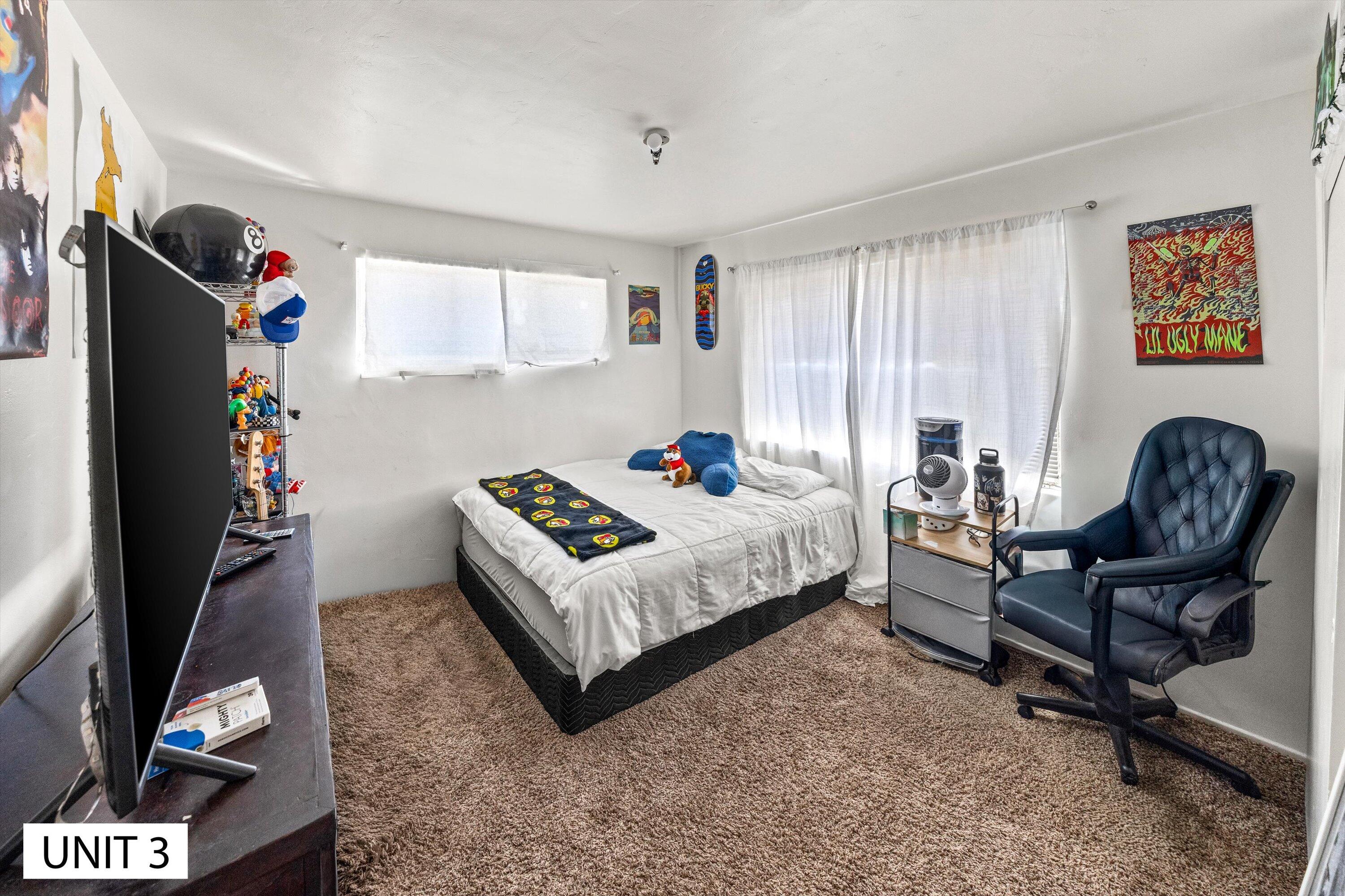 5859 Mandarin Drive Santa Barbara, CA 93117 - Photo 28 of 55 a bedroom with a bed and a couch