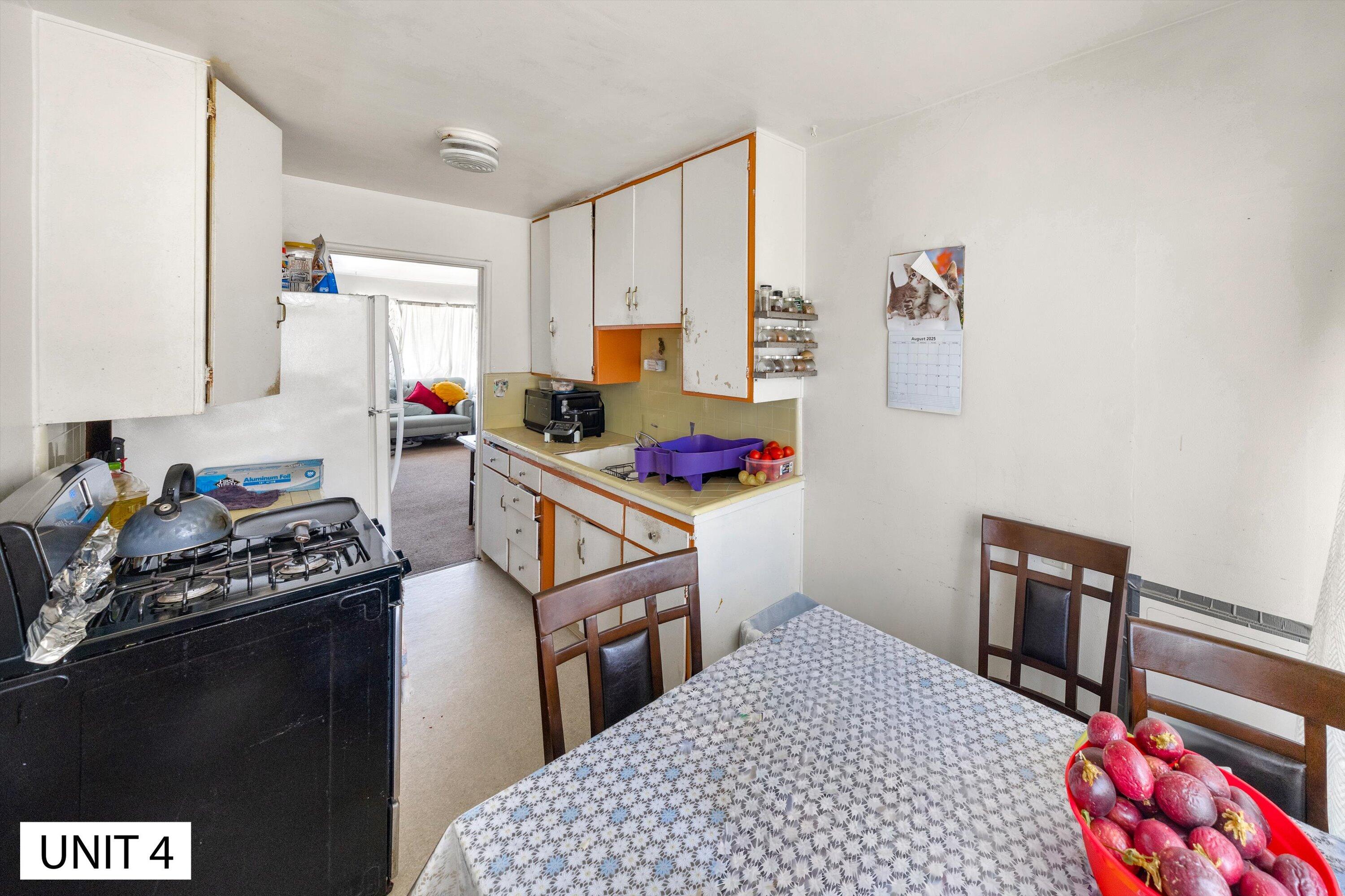 5859 Mandarin Drive Santa Barbara, CA 93117 - Photo 33 of 55 a kitchen with a refrigerator and a stove