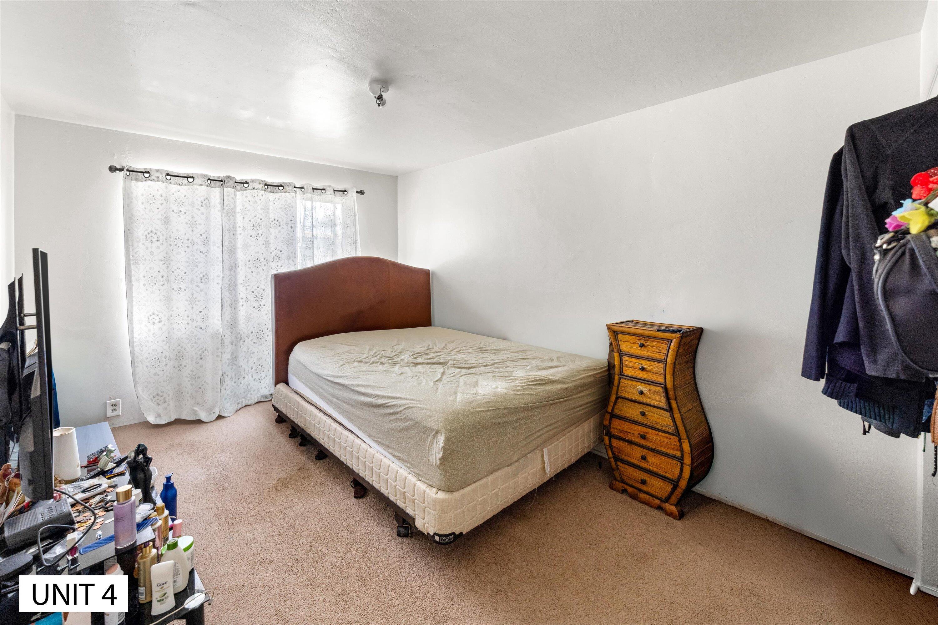 5859 Mandarin Drive Santa Barbara, CA 93117 - Photo 36 of 55 a bedroom with a bed and a window