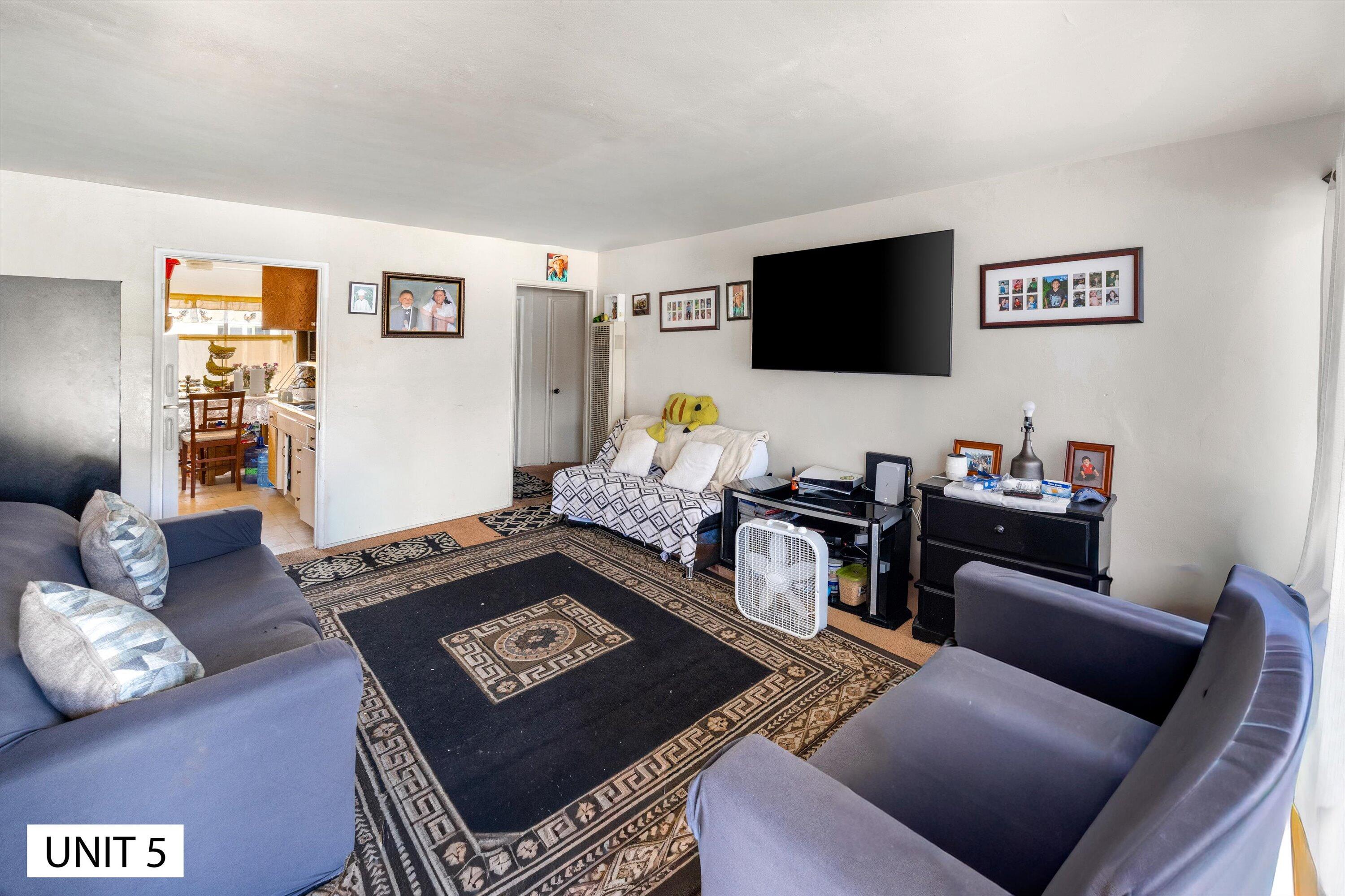 5859 Mandarin Drive Santa Barbara, CA 93117 - Photo 37 of 55 a living room with furniture and a flat screen tv