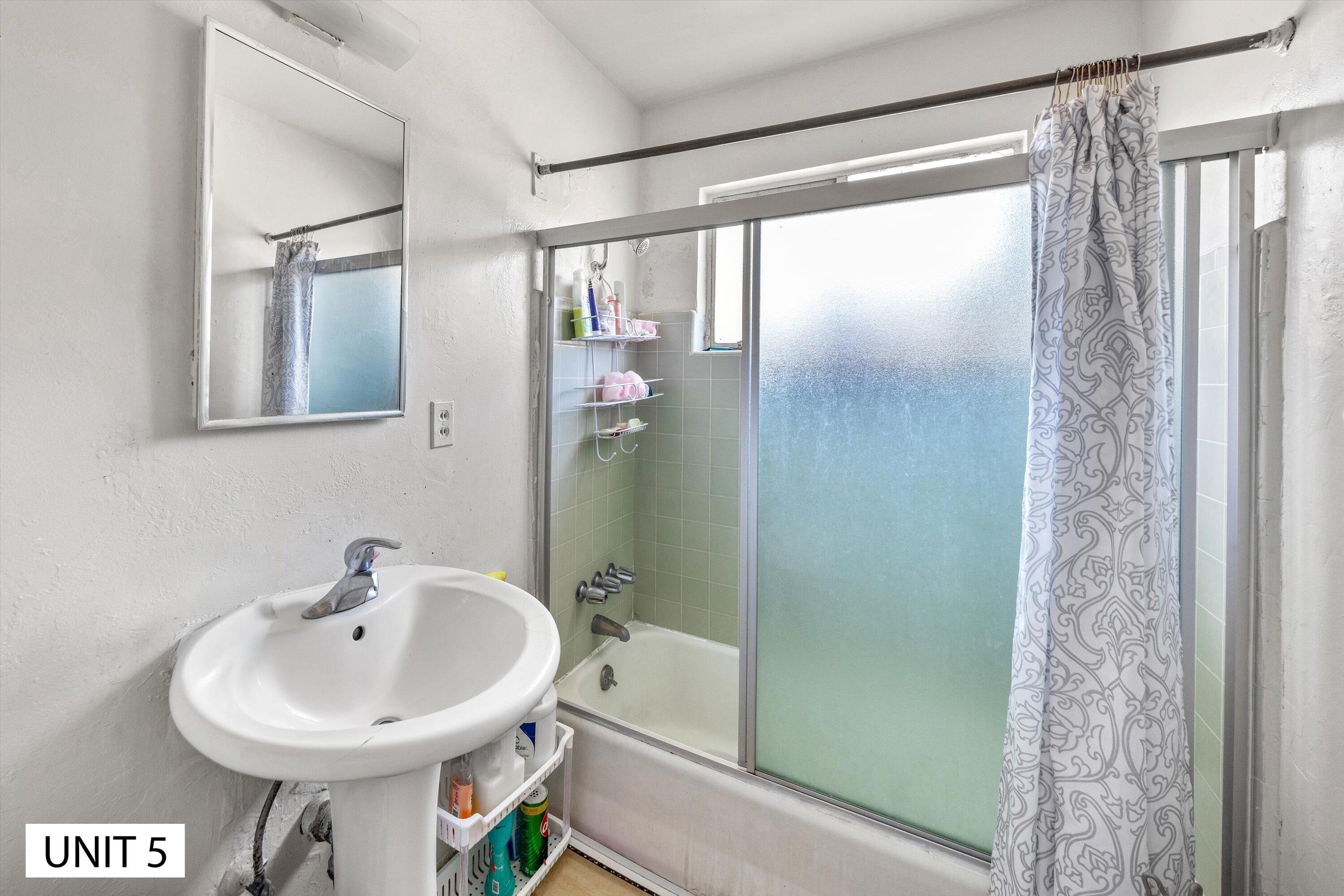 5859 Mandarin Drive Santa Barbara, CA 93117 - Photo 43 of 55 a bathroom with a sink toilet and shower
