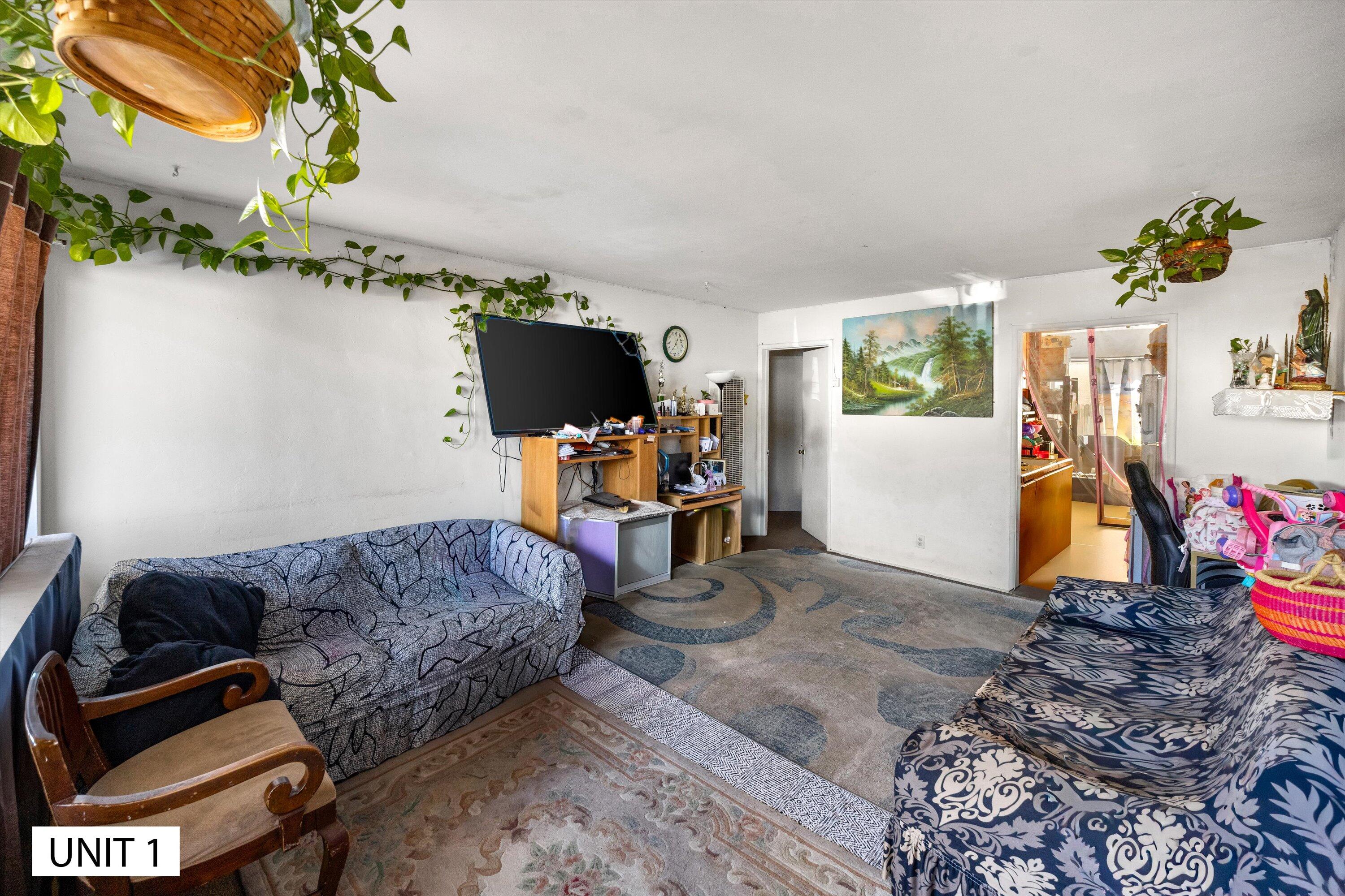 5859 Mandarin Drive Santa Barbara, CA 93117 - Photo 8 of 55 a living room with furniture and a flat screen tv