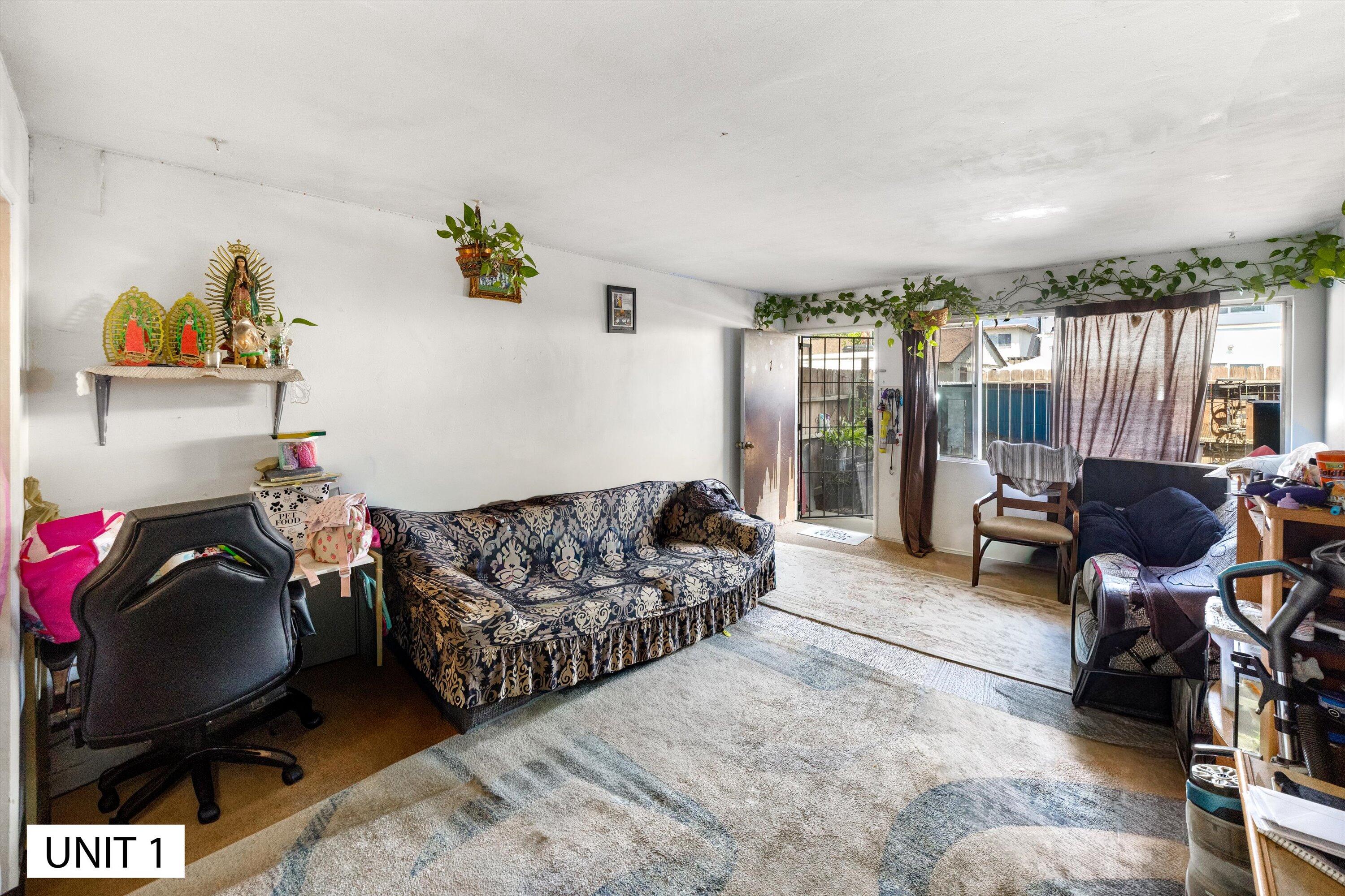 5859 Mandarin Drive Santa Barbara, CA 93117 - Photo 9 of 55 a livingroom with workspace and a couch