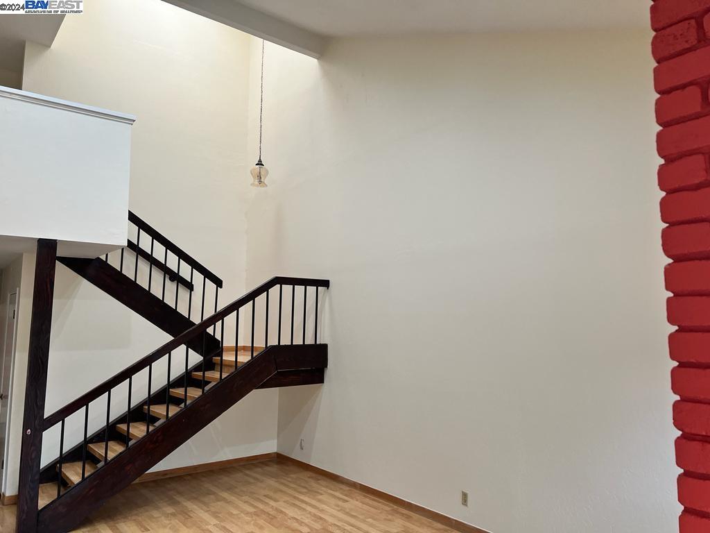 1064 Dempsey Road Milpitas, CA 95035 - Photo 14 of 31 a view of entryway with wooden floor