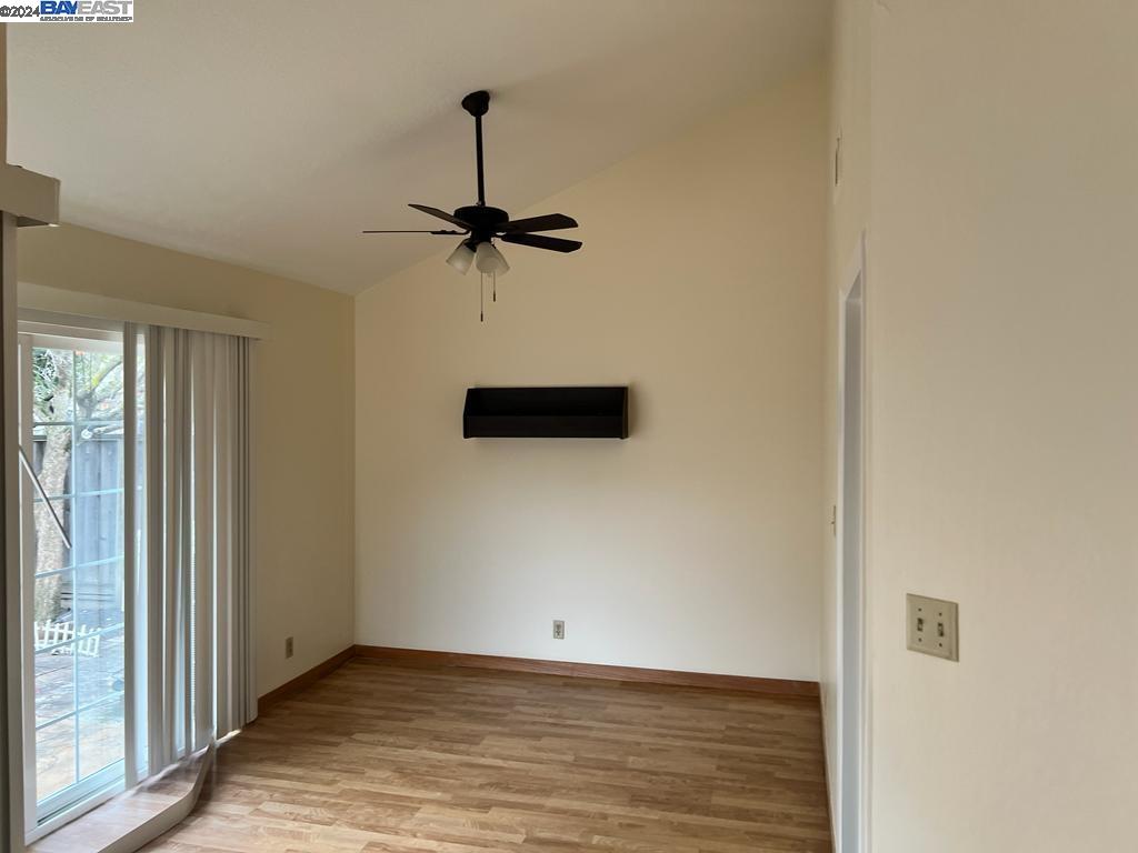 1064 Dempsey Road Milpitas, CA 95035 - Photo 6 of 31 a view of empty room with wooden floor