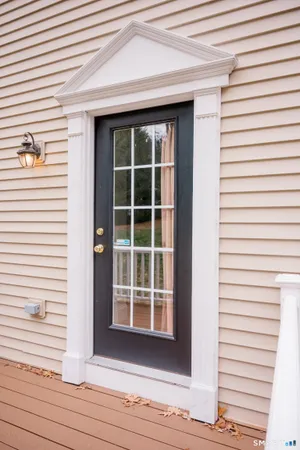 a view of a door and a window