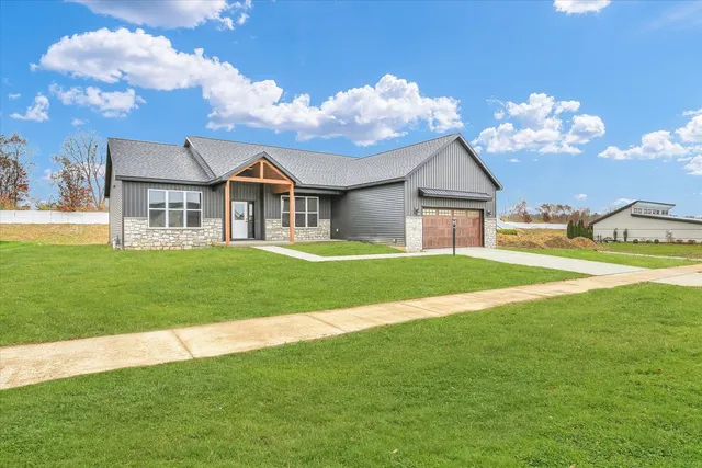 a view of a house with a big yard