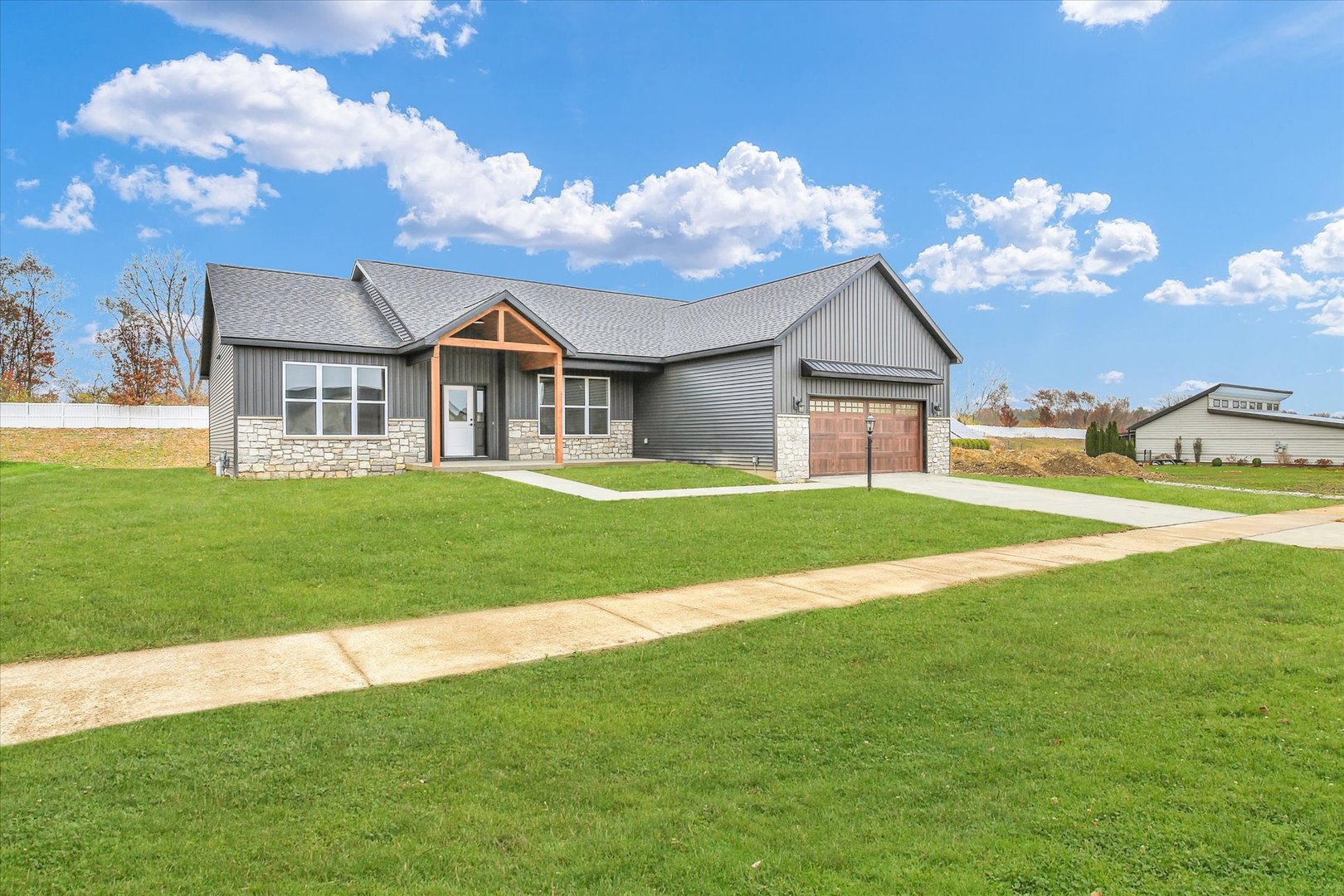 a view of a house with a big yard