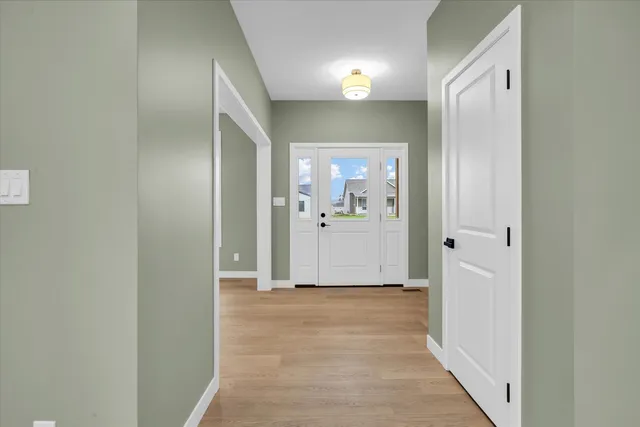 a view of a bathroom from a hallway