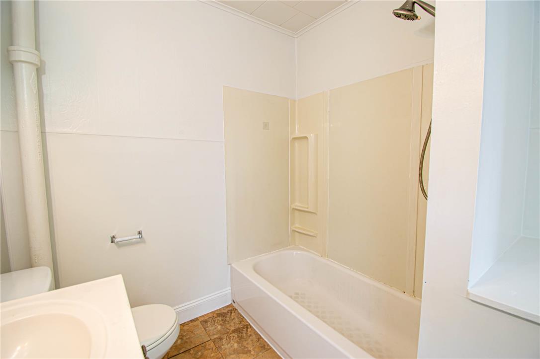 27 West Allen Street Allentown, PA 18102 - Photo 17 of 26 Functional full bathroom with durable flooring and essential fixtures for everyday convenience.