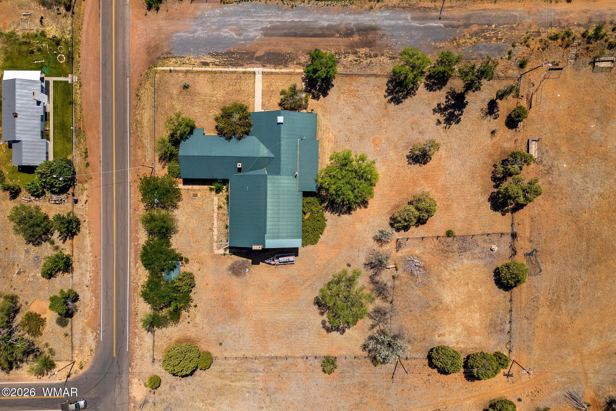 2116 Marble Road Clay Springs, AZ 85923 - Photo 16 of 48 an aerial view of a house with a yard